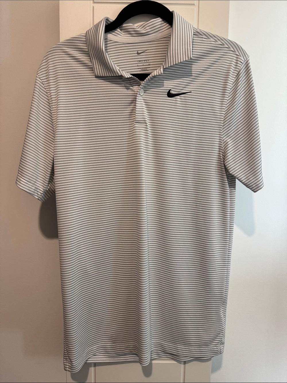 Nike Men’s White Polo with Thin gray Stripes